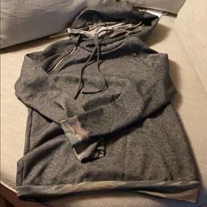 Double hooded sweatshirt.